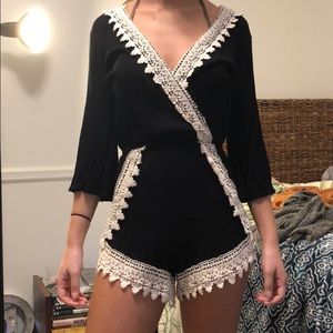 Black long sleeve romper with white lace